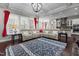 Open living area seamlessly connects to the kitchen, illuminated by natural light and features modern finishes at 2713 Tunstall Grove Dr, Apex, NC 27523