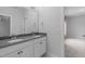 Stylish bathroom featuring dual sinks, modern fixtures, and framed mirror at 288 Whispering Wind Dr, Chapel Hill, NC 27516