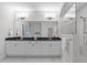 This bathroom boasts a large mirror, dual sink vanity, and walk-in shower at 288 Whispering Wind Dr, Chapel Hill, NC 27516