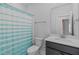 Well-lit bathroom showcasing a modern shower curtain and vanity at 288 Whispering Wind Dr, Chapel Hill, NC 27516