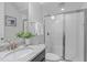 The bathroom features a walk-in shower, updated vanity, and large mirror at 288 Whispering Wind Dr, Chapel Hill, NC 27516