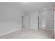 Large bedroom showcasing multiple doors, plush carpet and recessed lighting at 288 Whispering Wind Dr, Chapel Hill, NC 27516