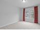Inviting bedroom with large window adorned with bright red patterned curtains at 288 Whispering Wind Dr, Chapel Hill, NC 27516
