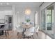 This modern dining room is filled with plenty of natural light and neutral tones at 288 Whispering Wind Dr, Chapel Hill, NC 27516