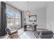 Stylish home office with hardwood floors, natural light, and modern chandelier at 288 Whispering Wind Dr, Chapel Hill, NC 27516
