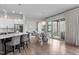 Open-concept kitchen and dining area with sliding glass doors to the back patio at 288 Whispering Wind Dr, Chapel Hill, NC 27516