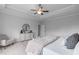 This main bedroom features an armchair, dresser, and comfortable decor at 288 Whispering Wind Dr, Chapel Hill, NC 27516