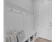 Mud room includes a bench, storage, and coat hooks at 288 Whispering Wind Dr, Chapel Hill, NC 27516