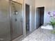 Bathroom featuring a tiled shower and granite countertop vanity at 2915 Cox Mill Rd, Sanford, NC 27332