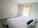 Cozy bedroom with natural light and neutral color scheme at 2915 Cox Mill Rd, Sanford, NC 27332