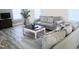Cozy living room with gray sofa, stylish coffee table, and bright natural light at 2915 Cox Mill Rd, Sanford, NC 27332