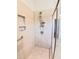 Walk-in shower featuring a showerhead with handheld attachment at 2915 Cox Mill Rd, Sanford, NC 27332