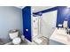 This bathroom has a walk-in shower, double sink, and white fixtures providing a clean functional space at 3014 Split Wood Ct, Oxford, NC 27565