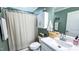 Clean bathroom featuring a vanity, toilet, and shower with a modern sink and a full-length curtain for privacy at 3014 Split Wood Ct, Oxford, NC 27565