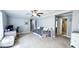 Bedroom featuring neutral walls, carpeted floors, and access to an en suite bathroom at 3014 Split Wood Ct, Oxford, NC 27565
