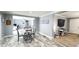 The dining area has wood-look floors and transitions into carpeted living spaces and bedrooms at 3014 Split Wood Ct, Oxford, NC 27565