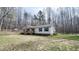 Charming one story home with front porch, landscaping, and spacious front yard at 3014 Split Wood Ct, Oxford, NC 27565