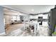 Open-concept layout with a kitchen island overlooking the living area, ideal for entertaining guests at 3014 Split Wood Ct, Oxford, NC 27565
