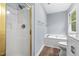 Updated bathroom with shower and soaking tub at 302 Rushingwater Dr, Cary, NC 27513