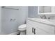 Updated half bathroom with marble countertop vanity, stylish fixtures, and modern finishes at 302 Rushingwater Dr, Cary, NC 27513