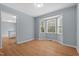 Open dining room with bay window and hardwood floors at 302 Rushingwater Dr, Cary, NC 27513