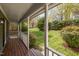 Inviting porch with wooden flooring and white railings, offering a relaxing outdoor space at 302 Rushingwater Dr, Cary, NC 27513