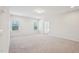 Spacious bedroom with neutral carpet, recessed lighting, and ample natural light coming through the windows at 3348 Table Mountain Pine Dr, Raleigh, NC 27616