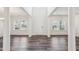 Bright, open foyer with high ceilings and hardwood floors, leading to various rooms at 3348 Table Mountain Pine Dr, Raleigh, NC 27616