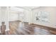 Open living room with natural light and hardwood floors, perfect for entertaining at 3348 Table Mountain Pine Dr, Raleigh, NC 27616
