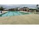 Community pool with ample seating and clubhouse offers residents a relaxing retreat at 3348 Table Mountain Pine Dr, Raleigh, NC 27616