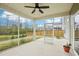 Screened porch with ceiling fan, offering an enjoyable space to relax and unwind at 3348 Table Mountain Pine Dr, Raleigh, NC 27616