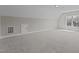 Bright and airy attic featuring neutral walls and carpeting and a dormer window at 381 Heart Pine Dr, Wendell, NC 27591