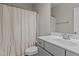 Modern bathroom featuring neutral colored walls, a shower, and a framed vanity mirror at 381 Heart Pine Dr, Wendell, NC 27591