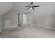 Spacious bedroom featuring carpeting, a ceiling fan, and a private ensuite bath at 381 Heart Pine Dr, Wendell, NC 27591