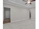 Spacious bedroom features neutral carpet, a ceiling fan, and two entryways at 381 Heart Pine Dr, Wendell, NC 27591
