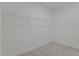 Walk-in closet featuring wire shelving for efficient storage and organization at 381 Heart Pine Dr, Wendell, NC 27591