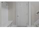 Entryway with a hall tree, bench, and coat hooks for easy organization at 381 Heart Pine Dr, Wendell, NC 27591