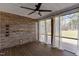 Relaxing screened-in porch with a wooden plank floor and open views at 381 Heart Pine Dr, Wendell, NC 27591