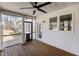View of the wooden porch with ceiling fan and white siding, creating a cozy outdoor space at 381 Heart Pine Dr, Wendell, NC 27591