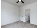 This carpeted bedroom offers a ceiling fan and an en-suite bath at 3908 Sage Ct, Wake Forest, NC 27587
