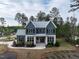 Beautiful two-story home featuring a stone facade and a well-manicured lawn at 3908 Sage Ct, Wake Forest, NC 27587