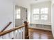 Bright hallway with hardwood floors, built-in bench seating, and ample natural light at 3908 Sage Ct, Wake Forest, NC 27587
