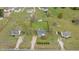 Birds-eye view of the property featuring a fenced backyard, storage shed, and surrounding landscape at 40 Hill Rd, Franklinton, NC 27525