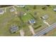 Aerial view of the home highlighting the large, fenced backyard, deck, and proximity to neighboring properties at 40 Hill Rd, Franklinton, NC 27525