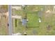 Aerial view of home with a spacious, fenced backyard, showcasing the property's layout and neighborhood at 40 Hill Rd, Franklinton, NC 27525