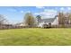 Lush backyard showcasing a spacious lawn, providing a serene and private outdoor space at 40 Hill Rd, Franklinton, NC 27525