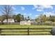 Fenced backyard with a well-maintained lawn, providing privacy and a secure area for recreation at 40 Hill Rd, Franklinton, NC 27525