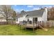 A spacious backyard with a deck and grill, perfect for outdoor entertaining at 40 Hill Rd, Franklinton, NC 27525