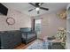 Charming Bedroom with soft pink walls, grey furnishings, and playful decor at 40 Hill Rd, Franklinton, NC 27525
