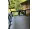 View of the wooden back porch with railing, offering great outdoor space at 4001 W Antioch Dr, Oxford, NC 27565